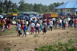 Người di cư gồm những người Bangladesh và người Hồi giáo Rohingya. (Ảnh: AFP/TTXVN)