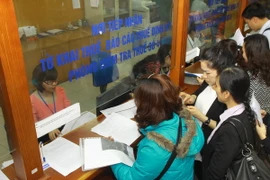 Nộp thuế tại Cục Thuế Hà Nội. (Ảnh minh họa: Hoàng Hùng/TTXVN)