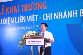 Phó Chủ tịch Thường trực HĐQT kiêm Tổng Giám đốc LienVietPostBank Phạm Doãn Sơn phát biểu tại lễ khai trương. (Nguồn: LienVietPostBank)