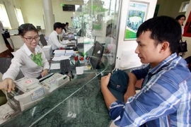 Giao dịch tại Vietcombank. (Nguồn: Vietcombank)