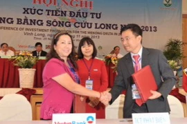 Lễ ký hợp đồng tín dụng giữa VietinBank và Tập đoàn Điện lực Việt Nam. (Nguồn: Vietnam+)