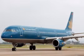 Máy bay của Vietnam Airlines chuẩn bị cất cánh. (Ảnh: Huy Hùng/TTXVN)