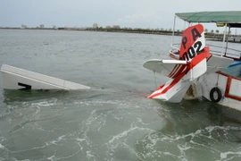 Hiện trường vụ rơi máy bay. (Nguồn: THX/TTXVN)