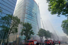 Diễn tập phương án xử lý tình huống cháy, nổ và cứu nạn, cứu hộ. (Ảnh: Thanh Vũ/TTXVN)