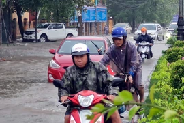 Mưa lớn gây ngập cục bộ ở thành phố Đồng Hới (Quảng Bình), tháng 10/2023. (Ảnh: Tá Chuyên/TTXVN)