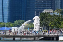 Lạm phát dai dẳng và kinh tế trì trệ đang ảnh hưởng tới cuộc sống của người dân Singapore. (Ảnh: AFP/TTXVN)