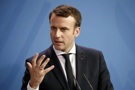 Tổng thống Pháp Emmanuel Macron tại cuộc họp báo ở Berlin, Đức. (Nguồn: EPA/TTXVN)