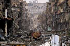 Cảnh đổ nát tại Deir al-Zor, Syria sau các cuộc không kích. (Nguồn: REUTERS/TTXVN)