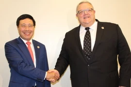 Phó Thủ tướng, Bộ trưởng Ngoại giao Phạm Bình Minh gặp Bộ trưởng Ngoại giao New Zealand Gerry Brownlee. (Ảnh: Xuân Vịnh/TTXVN)