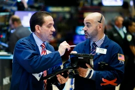 Giao dịch viên tại Sàn chứng khoán New York, Mỹ. (Nguồn: EPA/TTXVN)