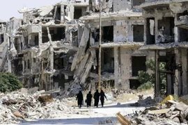 Cảnh đổ nát do chiến sự ở thành phố Homs, miền trung Syria. (Nguồn: AFP/TTXVN)