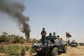 Các lực lượng Iraq trong một chiến dịch truy quét phiến quân IS. (Nguồn: AFP/TTXVN)