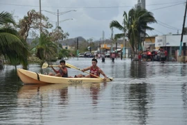Ngập lụt do bão Maria tại Juana Matos thuộc Catano, Puerto Rico ngày 21/9. (Nguồn: AFP/TTXVN)