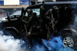 Cảnh sát Malaysia tham gia cuộc diễn tập an ninh tại Kuala Lumpur ngày 20/7 nhằm tăng cường đảm bảo an ninh cho ngày hội thể thao khu vực. (Nguồn: EPA/TTXVN)