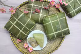 Bánh chưng là món ăn không thể thiếu trong ngày Tết cổ truyền. (Nguồn: Cooky)