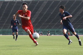 Cầu thủ U22 Việt Nam triển khai bóng tấn công. (Ảnh: Tuấn Cương/TTXVN)