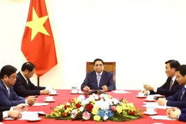 Chiều 4/4 tại Trụ sở Chính phủ, Thủ tướng Chính phủ Phạm Minh Chính điện đàm với Thủ tướng Quốc vụ viện Trung Quốc Lý Cường. (Ảnh: Lâm Khánh/TTXVN)
