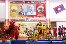 Tiết mục múa lân tại buổi lễ. (Ảnh: Đỗ Bá Thành/TTXVN)