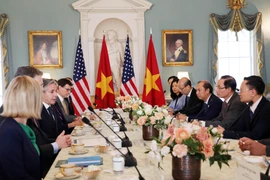 Quang cảnh cuộc làm việc của Trưởng Ban Đối ngoại Trung ương Lê Hoài Trung và Ngoại trưởng Hoa Kỳ Antony Blinken. (Ảnh: Kiều Trang/TTXVN)