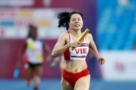 Vận động viên Nguyễn Thị Huyền trong đội hình Tiếp sức 4x400m Nữ Việt Nam. (Nguồn: Lao Động)