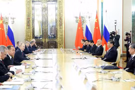 Tổng thống Nga Vladimir Putin và Chủ tịch Trung Quốc Tập Cận Bình tại cuộc hội đàm ở Moskva, ngày 21/3/2023. (Ảnh: THX/TTXVN)