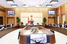 Các đại biểu biểu quyết tại phiên họp của Ủy ban Thường vụ Quốc hội chiều 30/12/2022. (Ảnh: Doãn Tấn/TTXVN)