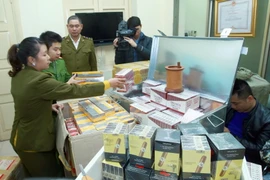 Tang vật một vụ buôn lậu thuốc lá bị bắt giữ ở Hà Nội. Ảnh minh họa. (Ảnh: Doãn Tấn/TTXVN)