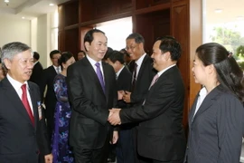 Chủ tịch nước Trần Đại Quang đến thăm, nói chuyện với cán bộ, nhân viên Đại sứ quán Việt Nam và đại diện cộng đồng Việt kiều. (Ảnh: Nhan Sáng/TTXVN)