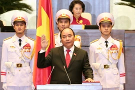 Thủ tướng Chính phủ Nguyễn Xuân Phúc tuyên thệ nhậm chức. (Ảnh: Thống Nhất/TTXVN)