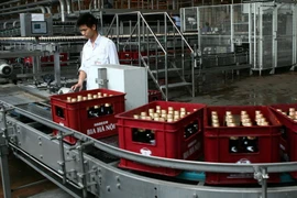 Dây chuyền sản xuất của Habeco tại nhà máy bia Hà Nội-Mê Linh. (Ảnh: Huy Hùng/TTXVN)