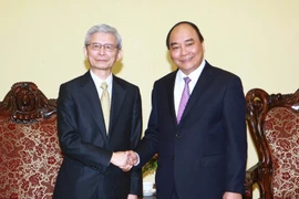 Phó Thủ tướng Nguyễn Xuân Phúc tiếp ngài Nobuyori Kodaira, Phó Chủ tịch Cấp cao Tập đoàn Toyota Nhật Bản đang thăm làm việc tại Việt Nam. (Ảnh: Doãn Tấn/TTXVN)