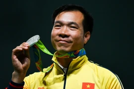 Xạ thủ Hoàng Xuân Vinh mang về tấm Huy chương thứ hai cho thể thao Việt Nam tại Olympic Rio ngày 10/8. (Nguồn: AFP/ TTXVN)