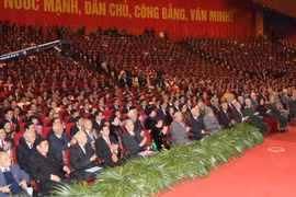 Các đồng chí lãnh đạo, nguyên lãnh đạo Đảng, Nhà nước và các đại biểu tham dự phiên khai mạc Đại hội. (Nguồn: TTXVN)