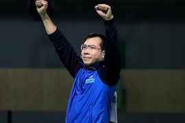 Xạ thủ Hoàng Xuân Vinh sau khi giành huy chương vàng, phá kỷ lục thế giới ở nội dung súng ngăn hơi 10m nam tại Olympic Rio ngày 6/8. (Nguồn: EPA/TTXVN)