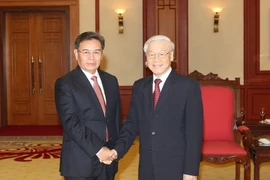 Tổng Bí thư Nguyễn Phú Trọng tiếp ông Saysomphone Phomvihane, Chủ tịch Ủy ban Trung ương Mặt trận Lào xây dựng đất nước. (Ảnh:Trí Dũng/TTXVN)