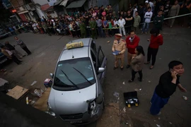 Hiện trường vụ đâm xe. (Ảnh: Minh Sơn/Vietnam+)