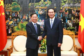 Đại tướng Trần Đại Quang, Ủy viên Bộ Chính trị, Bộ trưởng Bộ Công an tiếp Thứ trưởng Bộ Công an Trung Quốc Mạnh Khánh Phong. (Ảnh: Doãn Tấn/TTXVN)