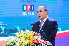 Thủ tướng Nguyễn Xuân Phúc phát biểu tại hội nghị. (Ảnh: An Đăng/TTXVN)