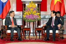 Chủ tịch nước Trương Tấn Sang tiếp Phó Thủ tướng Lào Somsavat Lengsavad sang thăm và làm việc tại Việt Nam. (Ảnh: Nguyễn Khang/TTXVN)