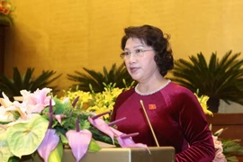 Chủ tịch Quốc hội, Chủ tịch Hội đồng bầu cử quốc gia Nguyễn Thị Kim Ngân trình Quốc hội phê chuẩn việc miễn nhiệm một số Phó Chủ tịch và một số Ủy viên Hội đồng bầu cử quốc gia. (Ảnh: Phương Hoa/TTXVN) 