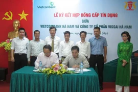 Lãnh đạo hai bên tham gia ký kết. (Nguồn: Vietcombank)