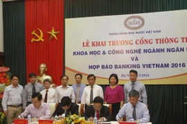 Các đại biểu tham dự lễ ký kết. (Nguồn: Ngân hàng Nhà nước)