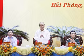 Chủ tịch nước Nguyễn Xuân Phúc chủ trì hội thảo. (Ảnh: Thống Nhất/TTXVN)