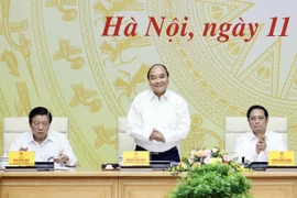 Chủ tịch nước Nguyễn Xuân Phúc làm việc với Ban Cán sự Đảng Chính phủ về Đề án xây dựng Nhà nước pháp quyền. (Ảnh: Thống Nhất/TTXVN)
