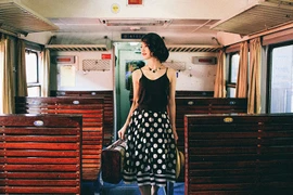 Trần Thị Quỳnh trên "chuyến tàu trở về." (Ảnh: Bánh Cam)