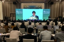 Hội thảo“Thúc đẩy Chuyển đổi số và Hiện đại hóa toàn diện ngành Tài chính,” ngày 17/11. (Ảnh: Vietnam+)