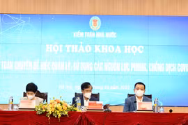 Hội thảo khoa học “Kiểm toán chuyên đề việc quản lý, sử dụng các nguồn lực phòng, chống dịch COVID-19,” ngày 19/1. (Ảnh: Vietnam+)