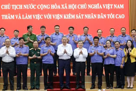Chủ tịch nước Tô Lâm với lãnh đạo Viện Kiểm sát nhân dân tối cao và các đại biểu. (Ảnh: Nhan Sáng/TTXVN)