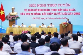 Thủ tướng Phạm Minh Chính phát biểu tại hội nghị thúc đẩy sản xuất, tiêu thụ ximăng, sắt thép và vật liệu xây dựng. (Ảnh: Dương Giang/TTXVN)