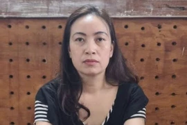 Đối tượng Nguyễn Thị Luyến, kế toán Phòng Công chứng số 1 tỉnh Lai Châu lừa đảo hàng tỷ đồng. (Ảnh: TTXVN phát)